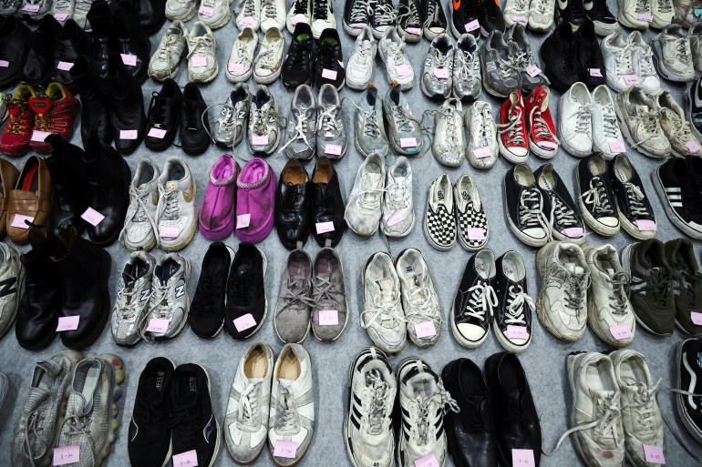 Shoes belonging to victims are arranged at a gym, where recovered belongings of the victims of a crowd crush that happened during Halloween festivities are kept, in Seoul, South Korea, November 1, 2022.