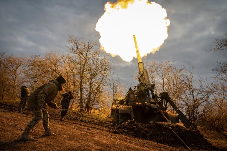 Ukrainian servicemen fire a 2S7 Pion self-propelled gun.
