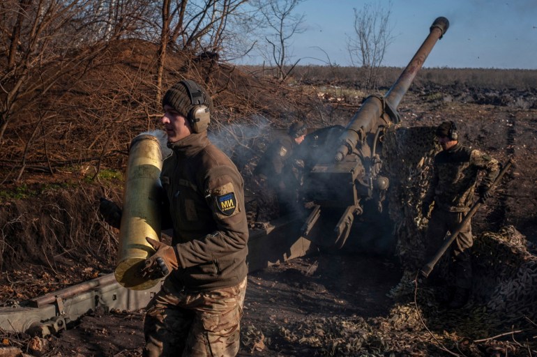 Ukrainian servicemen fire a 130 mm towed field gun M-46 on a front line, as Russia's attack on Ukraine continues, near Soledar, Donetsk region, Ukraine, in this handout image released November 10, 2022. Iryna Rybakova/Press Service of the 93rd Independent Kholodnyi Yar Mechanized Brigade of the Ukrainian Armed Forces