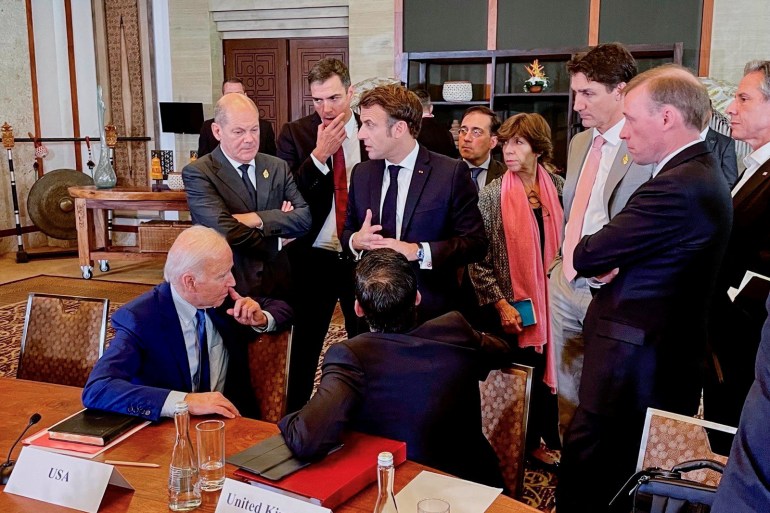German Chancellor Olaf Scholz, U.S. President Joe Biden, French President Emmanuel Macron, Spain's Prime Minister Pedro Sanchez, Britain's Prime Minister Rishi Sunak, Spain's Foreign Minister Jose Manuel Albares Bueno, French FM Catherine Colonna, Canada's Prime Minister Justin Trudeau, and U.S. Secretary of State Antony Blinken during talks about the missile strike on Poland at the G20 Leaders' Summit, in Nusa Dua, Bali, Indonesia, November 16, 2022.