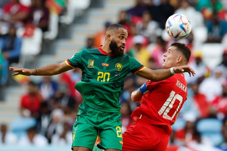 Switzerland's Granit Xhaka in action with Cameroon's Bryan Mbeumo