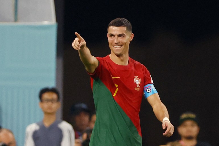 Portugal's Cristiano Ronaldo celebrates after scoring against Ghana at the 2022 FIFA World Cup on November 24