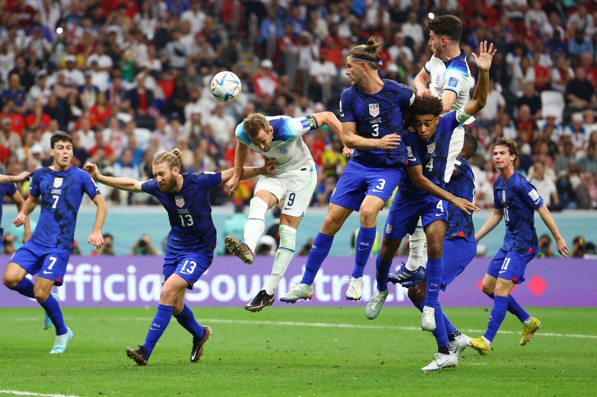 England's Harry Kane heads at goal