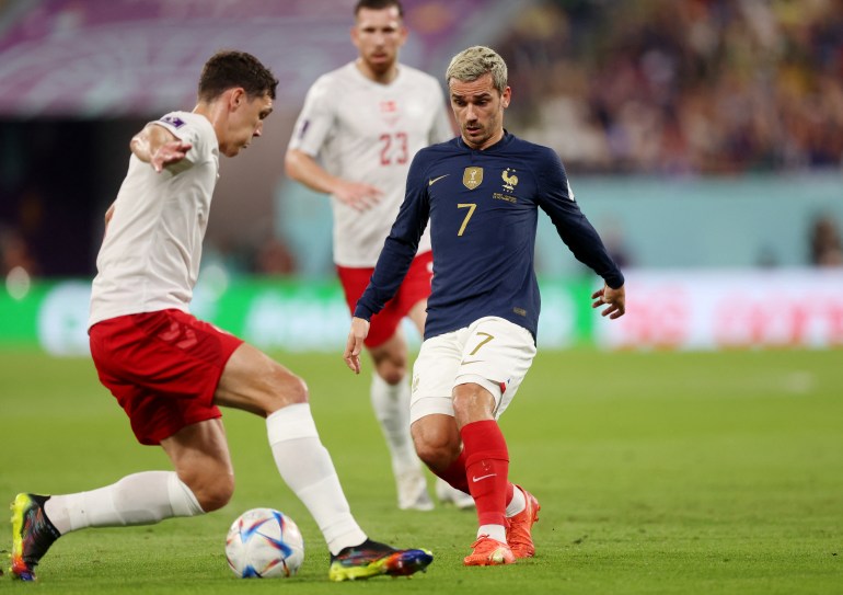Denmark's Andreas Christensen in action with France's Antoine Griezmann 