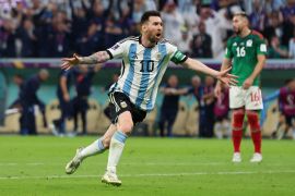Lionel Messi celebrates scoring a goal.