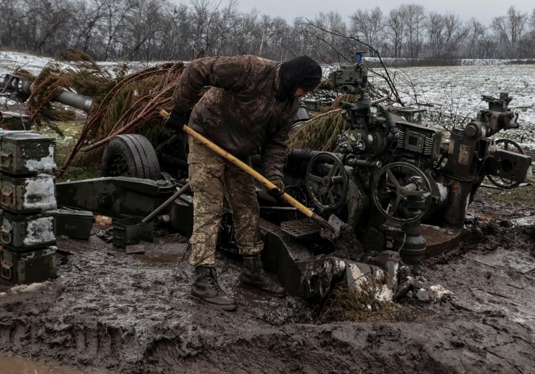 A Ukrainian service member works at an M777 Howitzer at a front line, as Russia's attack on Ukraine continues, in Donetsk Region, Ukraine November 23, 2022