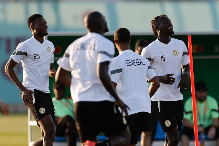 Senegal's Mamadou Loum Ndiaye, Famara Diedhiou and teammates during training