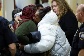 Families of victims hug outside courtroom in New York state