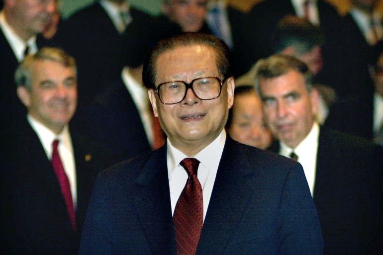 Chinese President Jiang Zemin smiles during a meeting with corporate executives attending the Fortune Global Forum in Hong Kong, China May 8, 2001. P