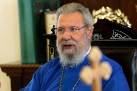 The leader of Cyprus' Greek Orthodox Church Archbishop Chrysostomos speaks to the media