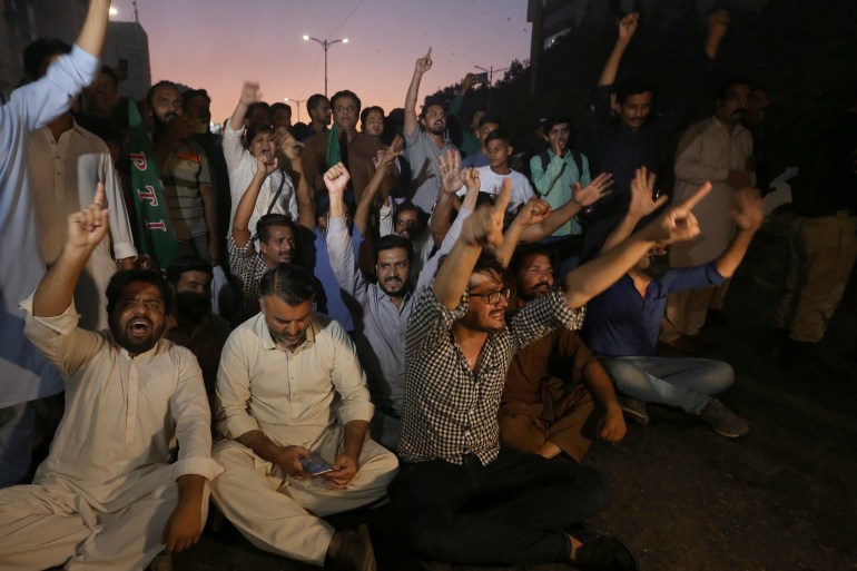 Supporters of former Pakistani Prime Minister Imran Khan, chant slogans