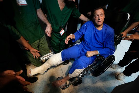 Former Pakistani Prime Minister Imran Khan leaves after a news conference in Shaukat Khanum hospital, where is being treated for a gunshot wound in Lahore, Pakistan