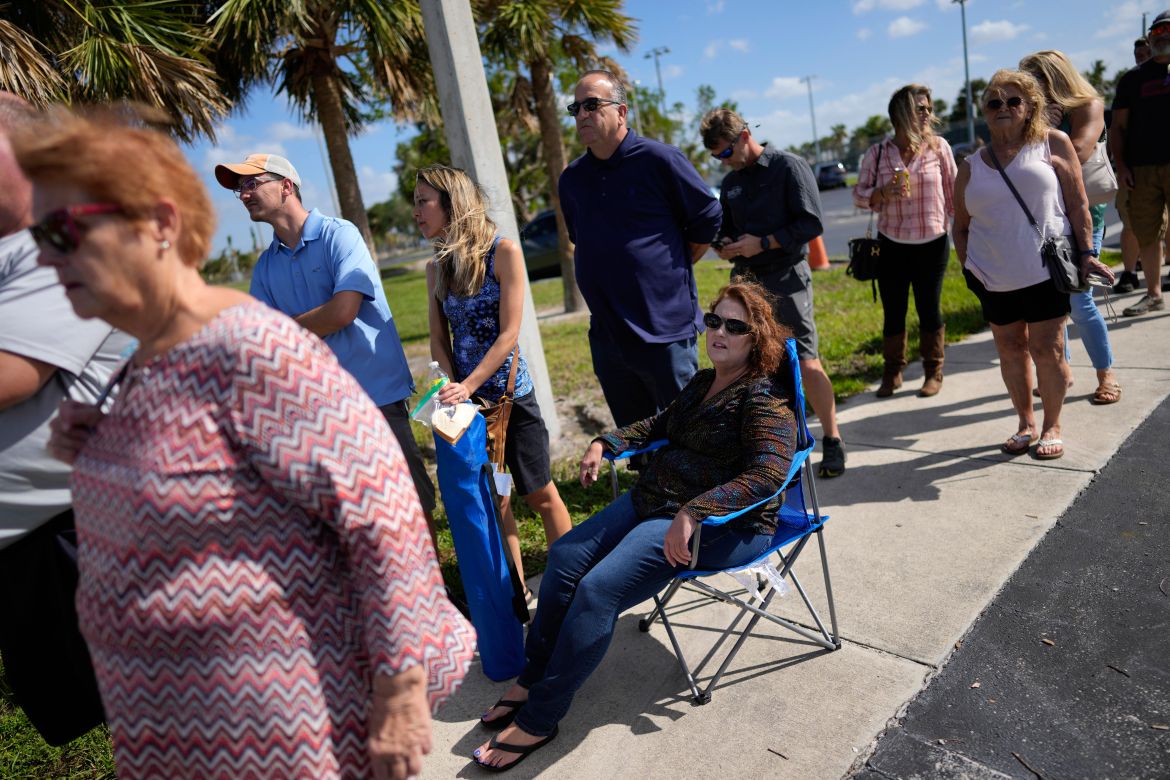 Lee County voters wait in line to cast their ballots.