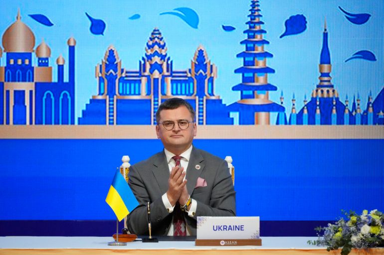Ukraine Foreign Minister Dmytro Kuleba applauds during the signing ceremony of a Treaty of Amity and Cooperation with Southeast Asian nations in Phnom Penh, Cambodia, Thursday, Nov. 10, 2022. (AP Photo/Vincent Thian)