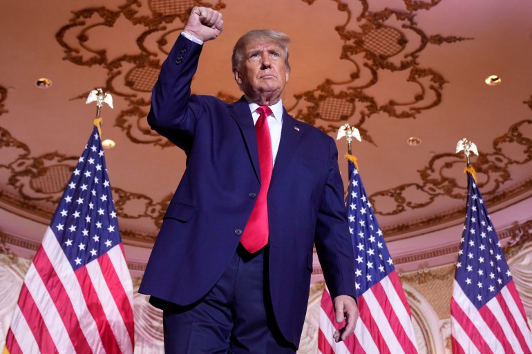 Donald Trump lifts a fist at Mar-a-Lago as he announces his presidential bid for 2024