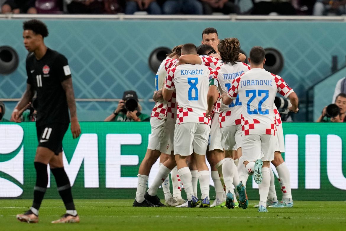 Croatia's Marko Livaja celebrates with his teammates after scoring his side's second goal during the World Cup group F soccer match between Croatia and Canada, at the Khalifa International Stadium in Doh