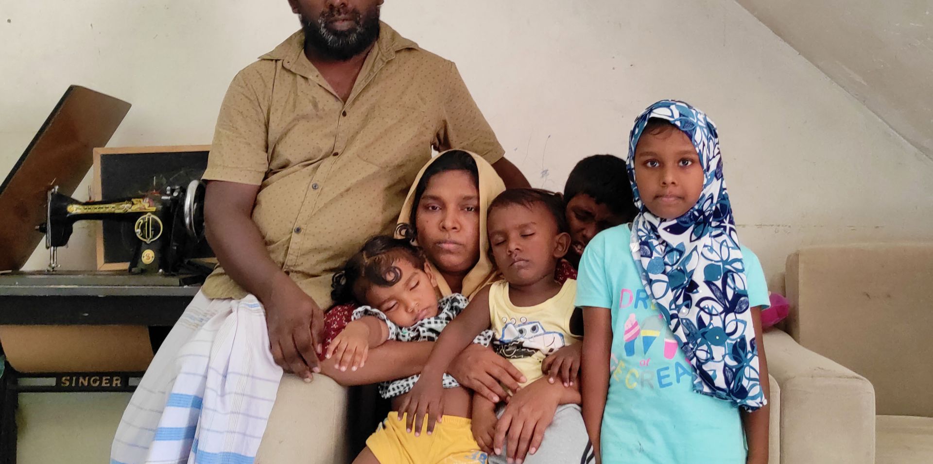 A family of six in their home in Colombo, Sri Lanka