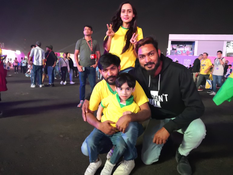 A family enjoys their time at a FIFA Fan Zone in Doha