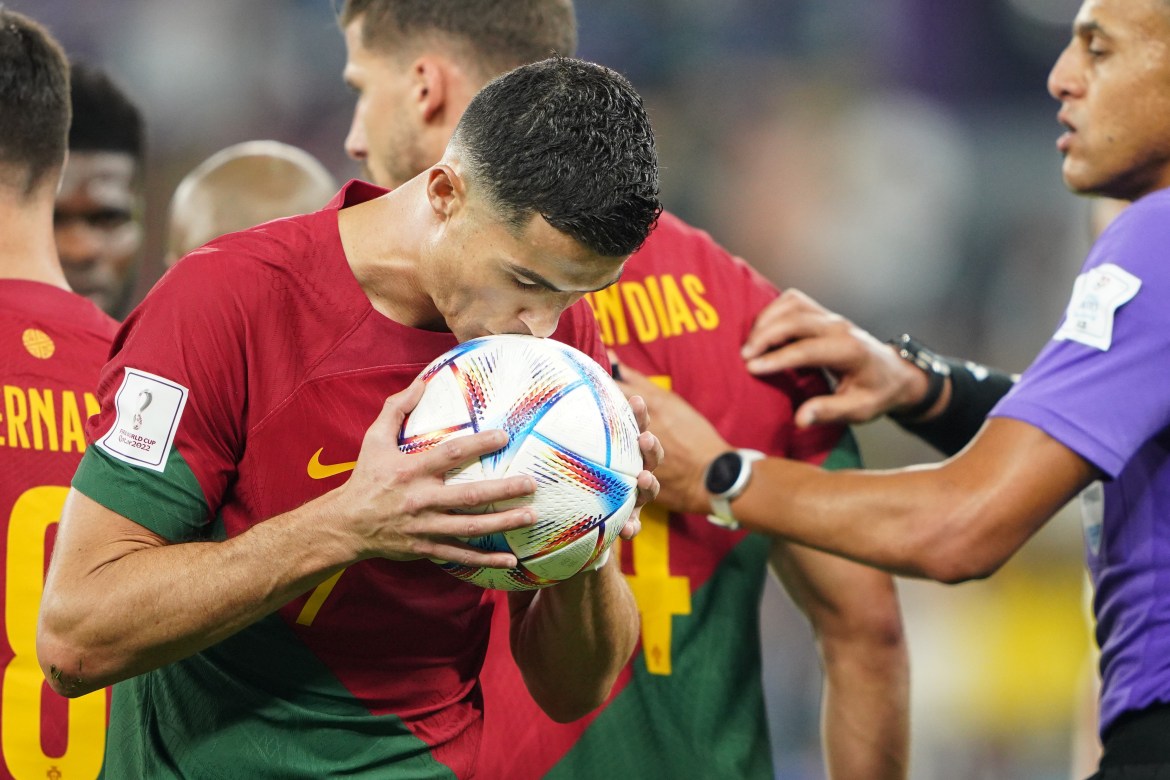 Ronaldo kisses the ball