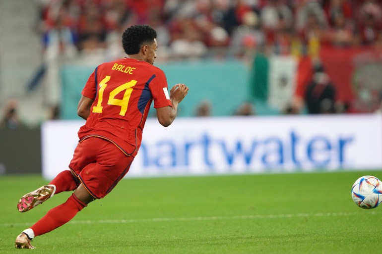 Spanish player Alejandro Balde going for the ball during the Spain vs Costa Rica football match.