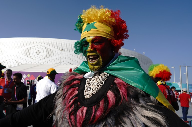 Senegal fans arrive at the stadium ahead of the game. Qatar vs Senegal Group A, FIFA World Cup 2022 at Al Thumama stadium, in Doha, Qatar November 25 [Sorin Furcoi/Al Jazeera]
