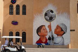 FIFA World Cup Qatar 2022 mural at Katara Cultural Village in Doha, Qatar, Nov 13, 2022 [Sorin Furcoi/Al Jazeera]