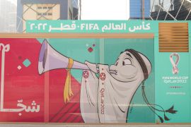 La'eeb, the Official Mascot for this year's FIFA World Cup 2022, on a bus station in Doha's West Bay area, Qatar, Nov 13, 2022 [Sorin Furcoi/Al Jazeera]