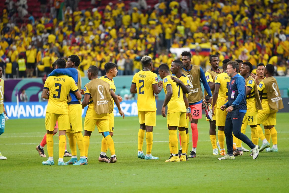 Members of the Ecuadorian team shaking hands