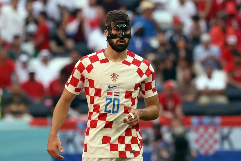 A Croatian player with a protective facial mask during the Croatia vs Morocco game on November 23,