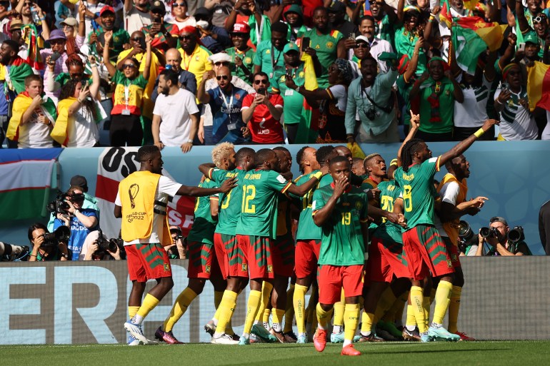 Cameroon players celebrate