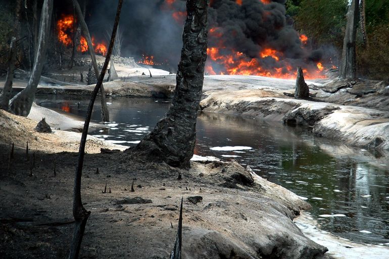 Oil from a leaking pipeline burns in Goi-Bodo, a swamp area of the Niger Delta in Nigeria