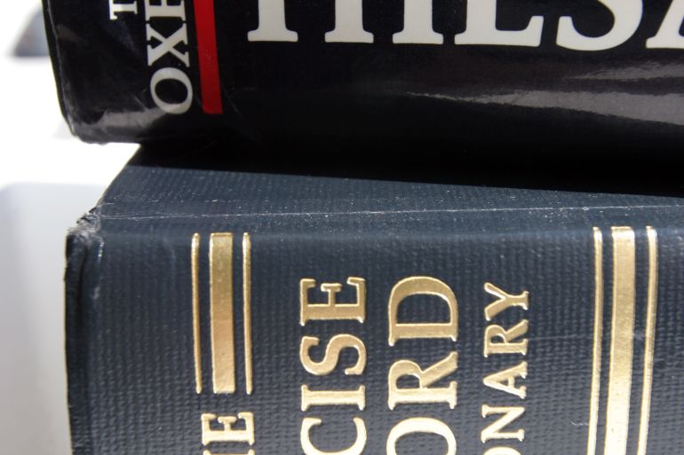 A generic picture of an English dictionary and a thesaurus
