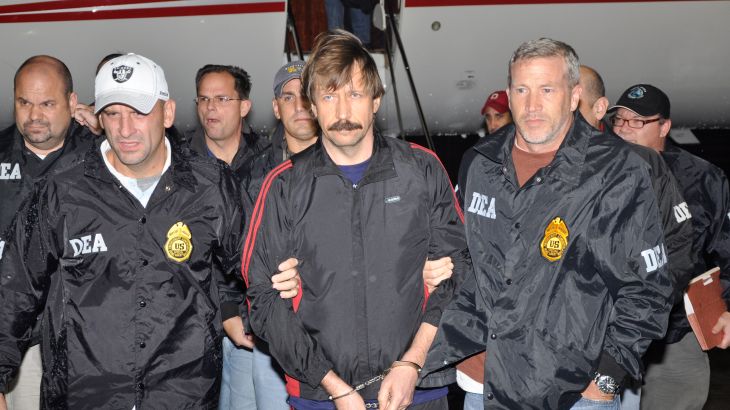 Suspected Russian arms dealer Viktor Bout (C) is escorted by Drug Enforcement Administration (DEA) officers after arriving at Westchester County Airport in White Plains, New York November 16, 2010. Bout arrived in New York from Thailand on Tuesday to face U.S. terrorism charges, the U.S. Justice Department said. REUTERS/U.S. Department of Justice/Handout (UNITED STATES - Tags: POLITICS CRIME LAW IMAGES OF THE DAY) FOR EDITORIAL USE ONLY. NOT FOR SALE FOR MARKETING OR ADVERTISING CAMPAIGNS. THIS IMAGE HAS BEEN SUPPLIED BY A THIRD PARTY. IT IS DISTRIBUTED, EXACTLY AS RECEIVED BY REUTERS, AS A SERVICE TO CLIENTS