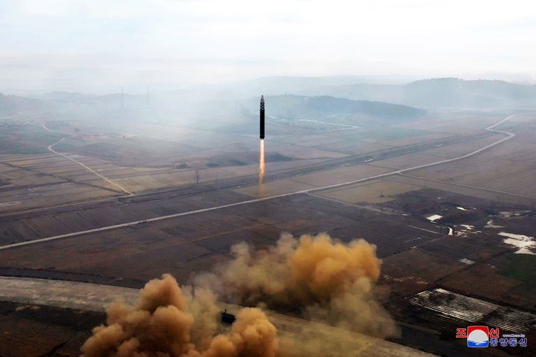 An intercontinental ballistic missile (ICBM) is launched in this undated photo released on November 2022 by North Korea's official Korean Central News Agency [KCNA via Reuters]