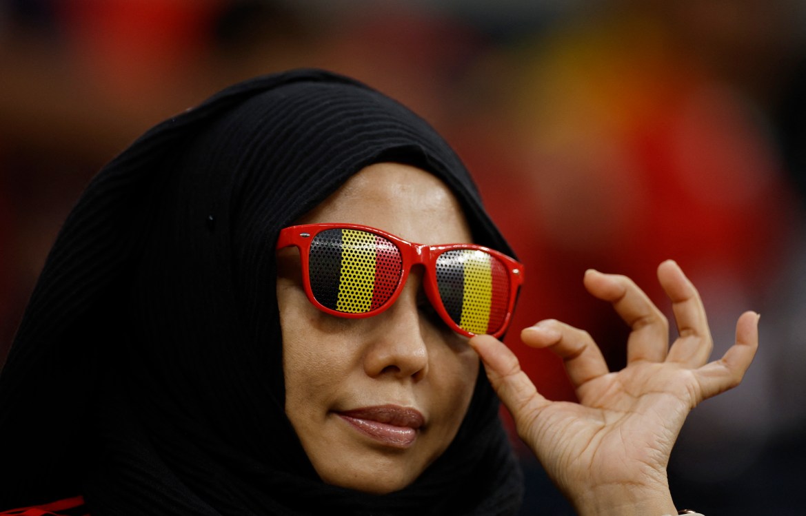 Belgium fan wearing sun glasses inside the stadium before the match