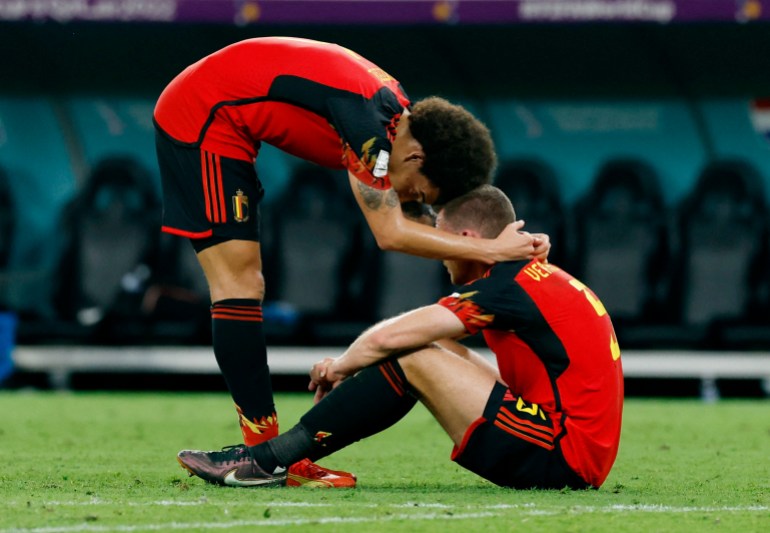 Belgium's Axel Witsel and Jan Vertonghen look dejected after the match as Belgium are eliminated from the World Cup
