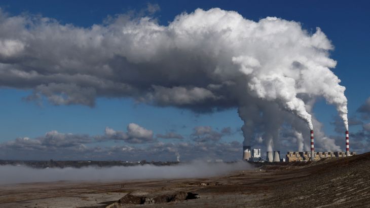 FILE PHOTO: Smoke and steam billow from Belchatow Power Station, Europe's largest coal-fired power plant powered by lignite, in Kleszczow, Poland October 20, 2022. REUTERS/Kuba Stezycki/File Photo