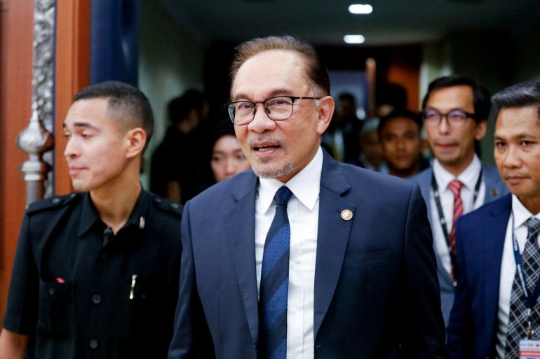 Malaysia's Prime Minister Anwar Ibrahim leaves the lower house of parliament after receiving a vote of confidence, in Kuala Lumpur, Malaysia December 19, 2022.