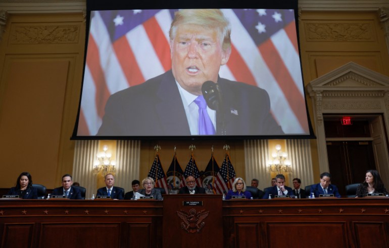 Donald Trump appears on a screen during the final Jan 6 committee session