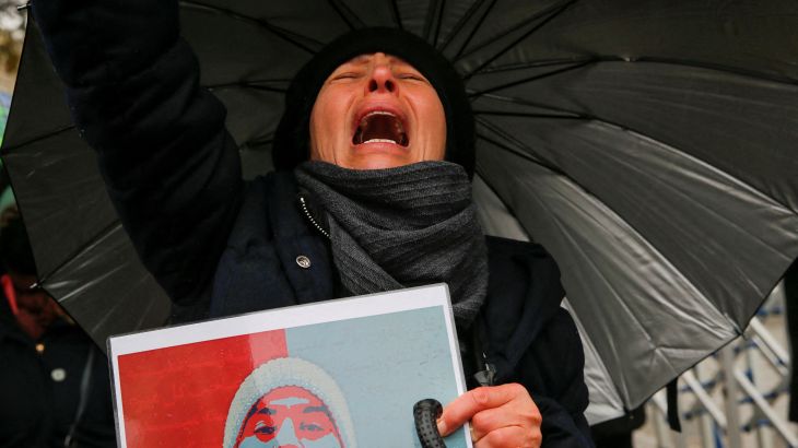 A woman attends a protest of members of the Iranian community living in Turkey in support of Iranian women, after the death of Mahsa Amini, in Istanbul