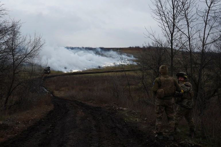 A Ukrainian grad launcher fires from the launch, as Russia's attack on Ukraine continues, on the frontline in Bakhmut