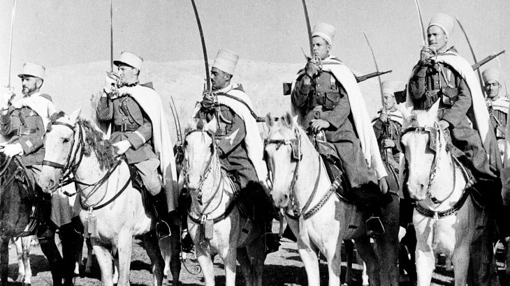FILE - French officers and colonial soldiers are part of France's armed force of 100,000 men in Morocco, seen Jan. 11, 1937 in Rabat. France threatens to use them to invade Spanish Morocco unless the presence of German troops there is prohibited. (AP Photo/Black Star)