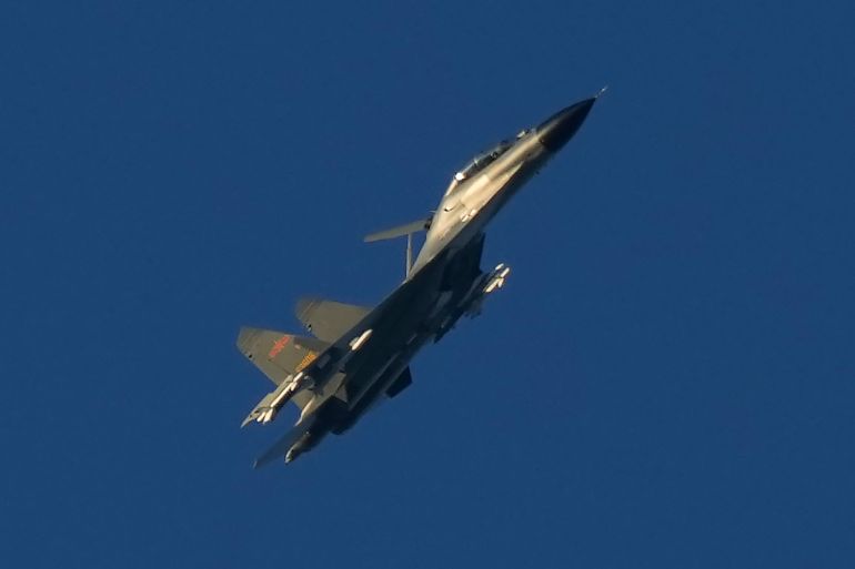 A Chinese J-11 military fighter jet flies above the Taiwan Strait in August 2022.