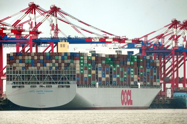 The 'OOCL United Kingdom' container vessel is anchored at the 'Jade Weserport' container terminal in Wilhelmshaven, Germany.