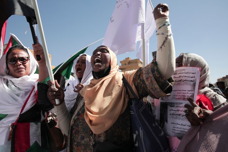 Sudanese demonstrators attend a rally to demand the return to civilian rule a year after a military coup, in Khartoum, Sudan, Nov. 17, 2022. Sudan’s ruling generals and the main pro-democracy group signed a framework deal until elections on Monday, Dec. 5, 2022, but key dissenters have stayed out of the agreement.