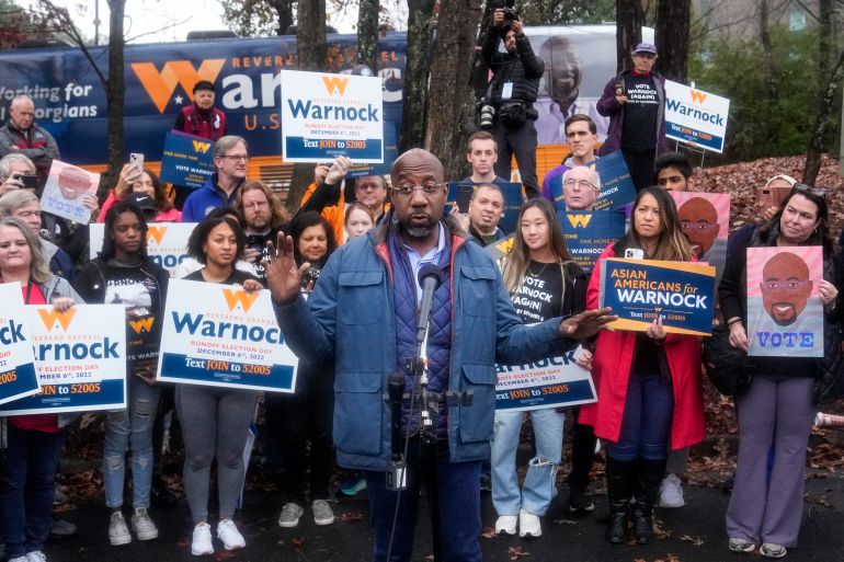 Democratic Sen. Raphael Warnock speaks during an election day canvass launch on Tuesday, Dec. 6, 2022.