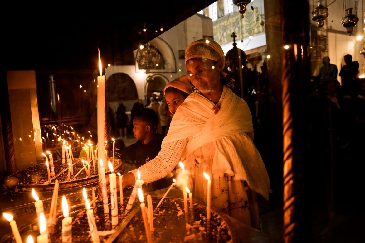 An Ethiopian woman and her child visit the Church of the Nativity,