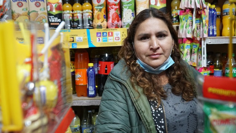 Carmen Alfaro stand in her store in Lima