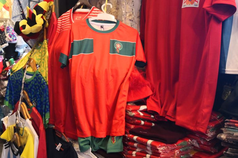 A Moroccan national team replica shirt hangs in a shop in Souq Waqif, Doha, Qatar