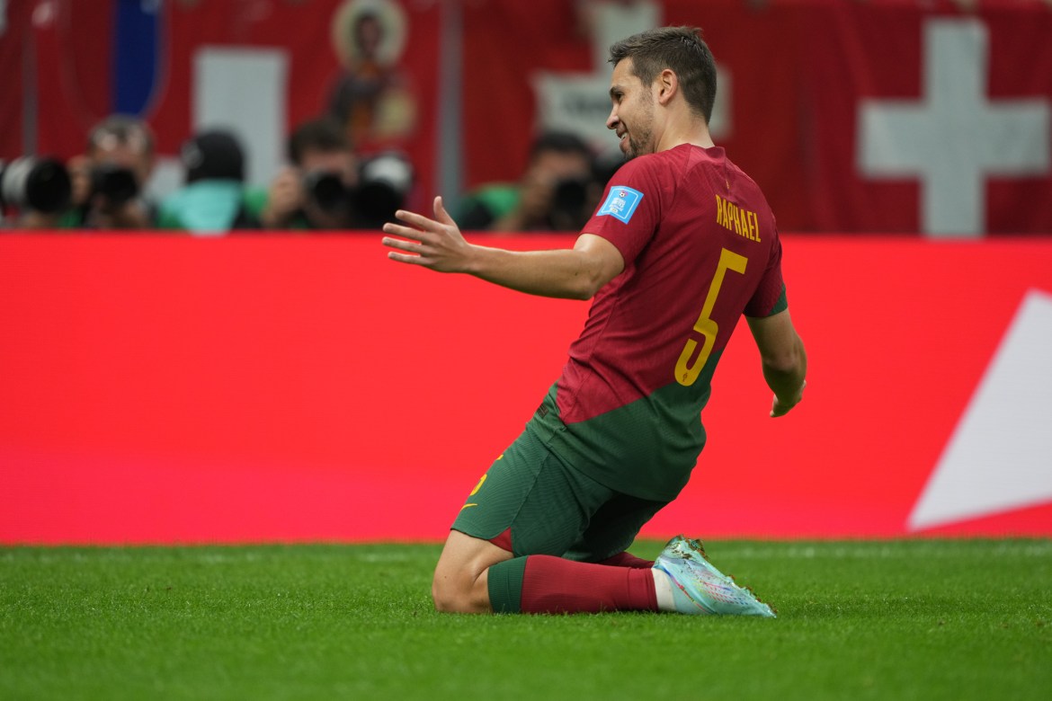 Raphael Guerreiro celebrates scoring Portugal's fourth goal.